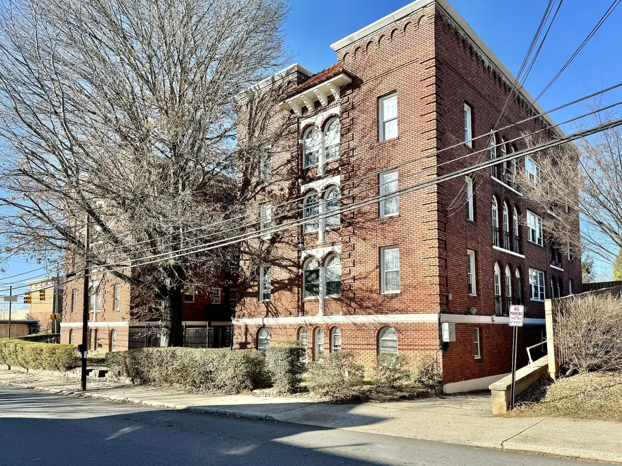 The Jefferson Apartments, a red brick apartment building built in 1923, at Merrimon Avenue and Chestnut Street.